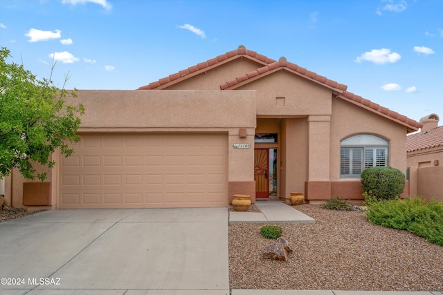 view of front of house with a garage