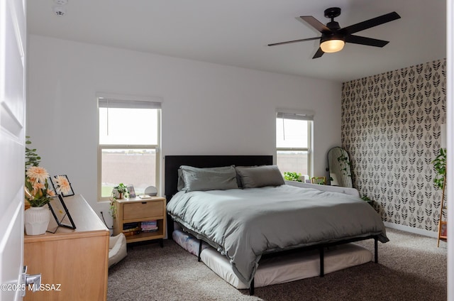 carpeted bedroom featuring ceiling fan