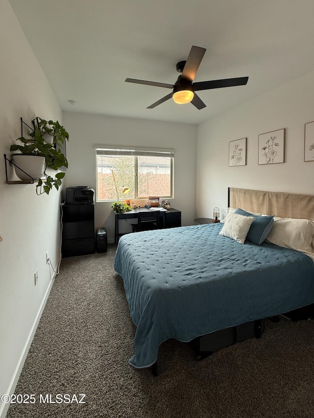 bedroom featuring baseboards, carpet floors, and a ceiling fan