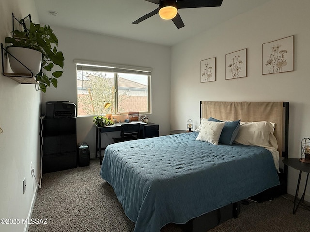 bedroom with ceiling fan and carpet floors