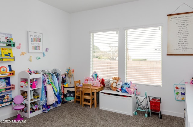 playroom featuring carpet and baseboards