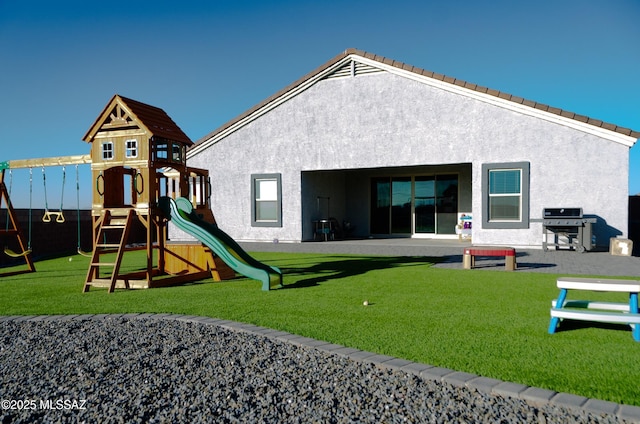 view of play area with a lawn