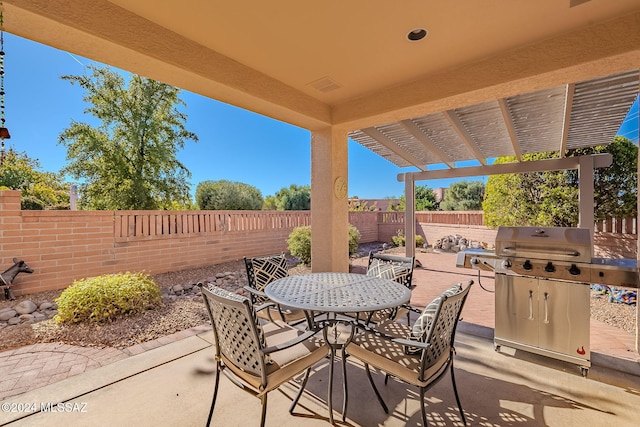 view of patio / terrace featuring a pergola