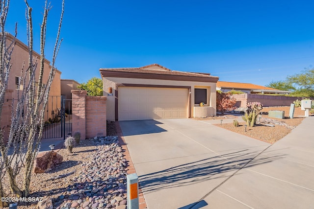 view of front of property featuring a garage