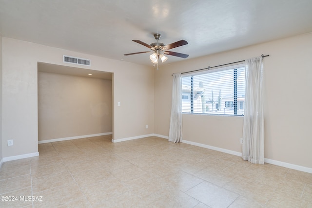 spare room featuring ceiling fan