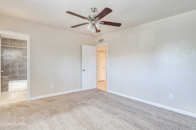 carpeted empty room with ceiling fan