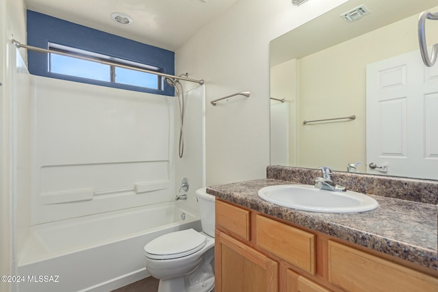 full bathroom featuring vanity,  shower combination, and toilet