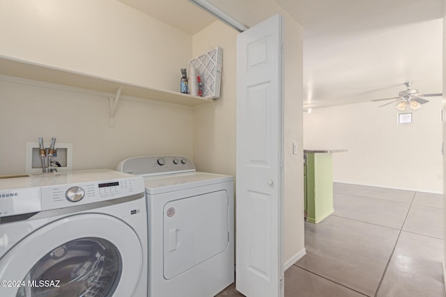 laundry room with washer and dryer, light tile patterned floors, and ceiling fan