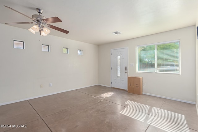 entrance foyer featuring ceiling fan