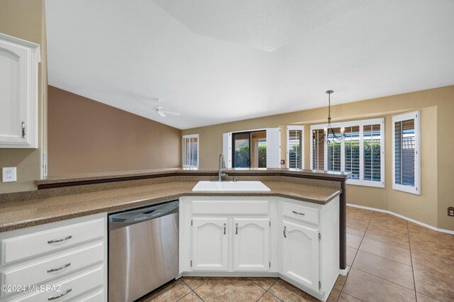 kitchen featuring dishwasher, sink, ceiling fan, white cabinetry, and kitchen peninsula