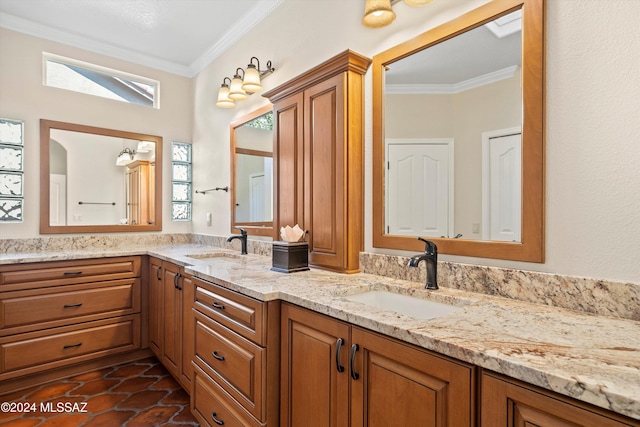 bathroom featuring vanity and ornamental molding