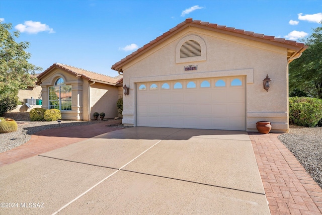 view of front of house with a garage