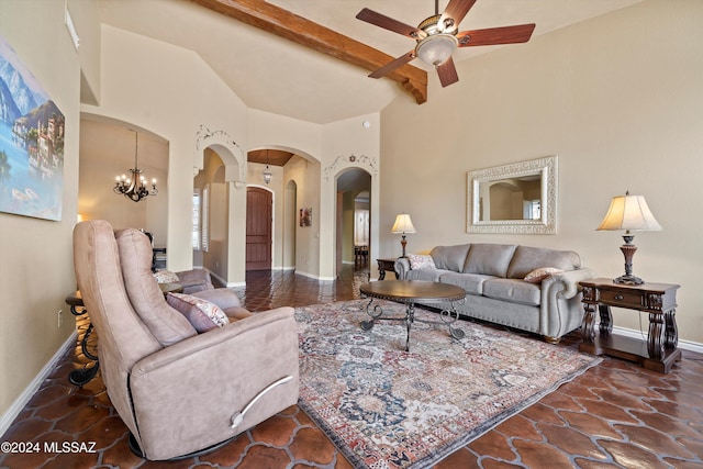 living room with beamed ceiling, ceiling fan with notable chandelier, and high vaulted ceiling