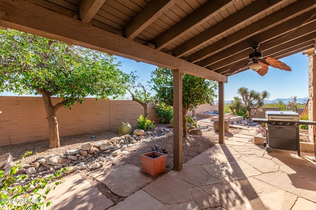 view of patio with ceiling fan