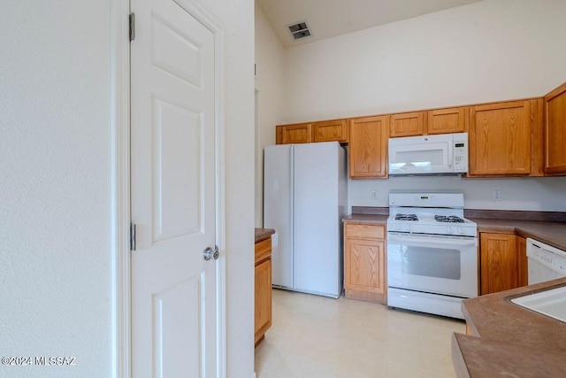 kitchen featuring white appliances