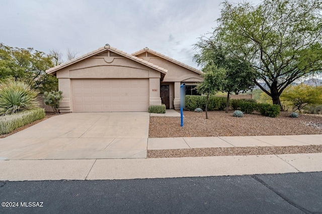 view of front of home with a garage