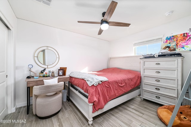 bedroom with a closet and ceiling fan