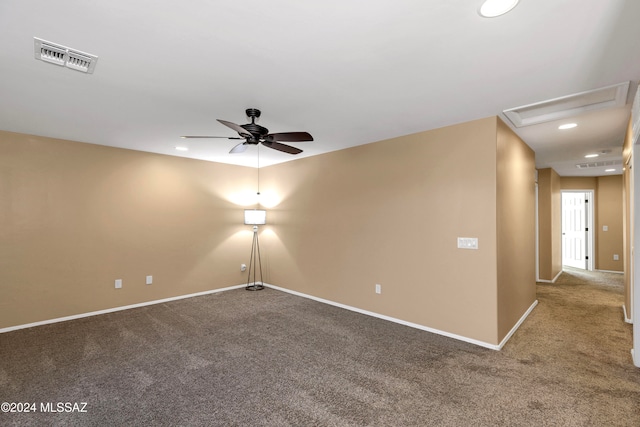 carpeted empty room featuring ceiling fan