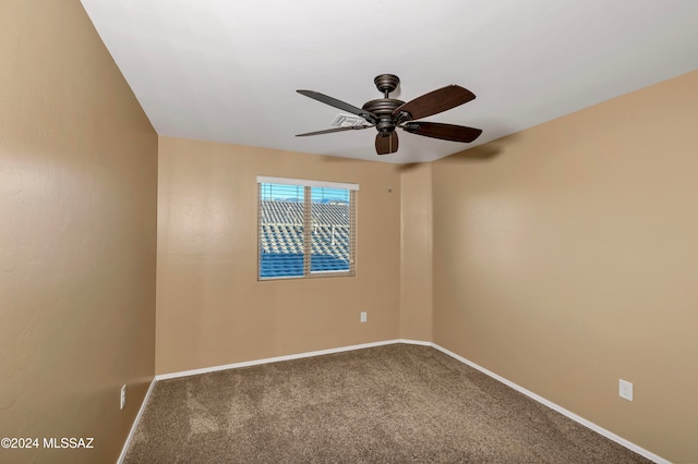 carpeted empty room with ceiling fan