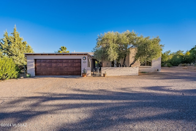 view of front of home with a garage