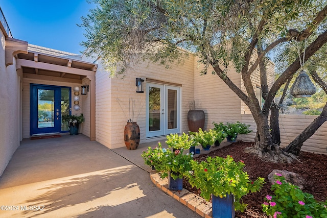 view of exterior entry with french doors