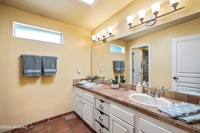 bathroom featuring tile patterned flooring and vanity