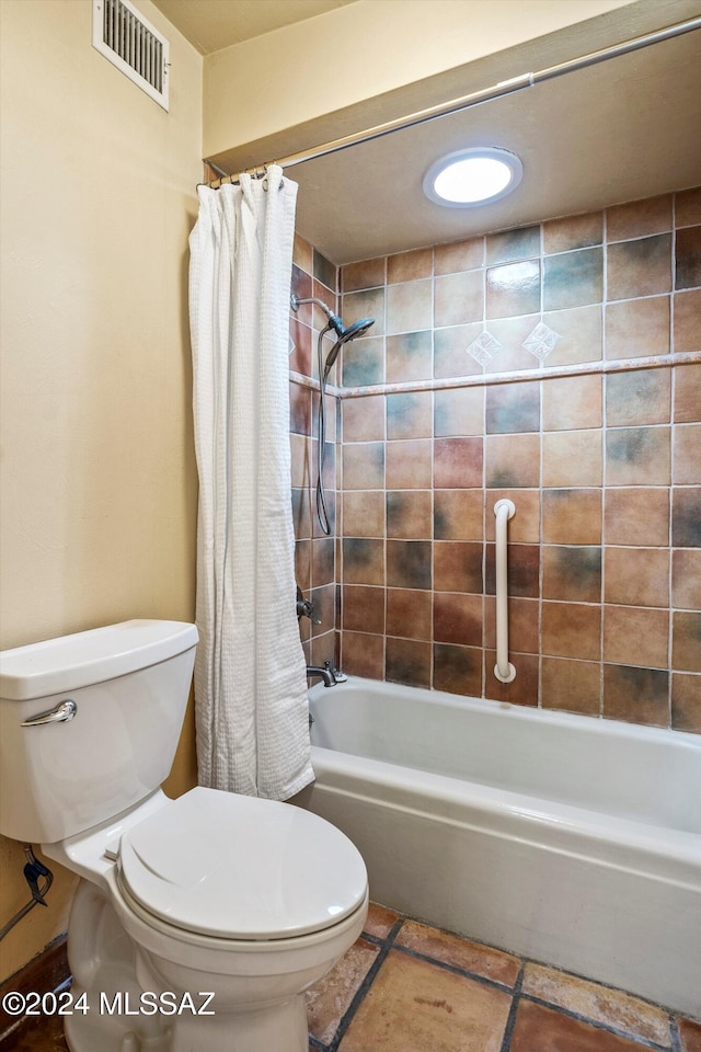 bathroom featuring shower / bath combination with curtain and toilet