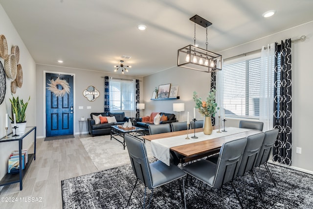 dining space featuring light hardwood / wood-style flooring