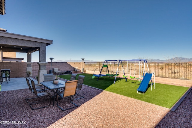 view of patio / terrace featuring a playground