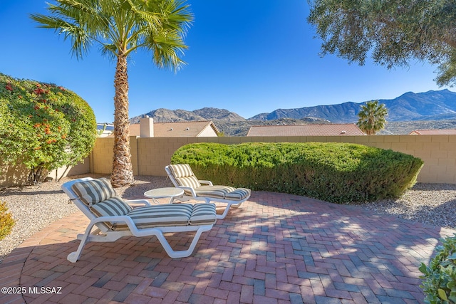 view of patio featuring a mountain view