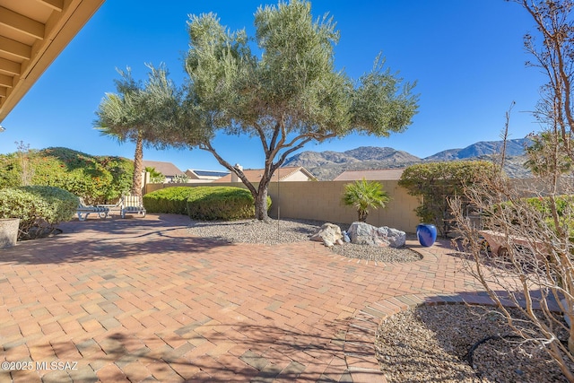 view of patio / terrace with a mountain view