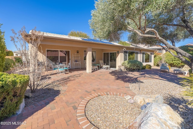 rear view of house with a patio area