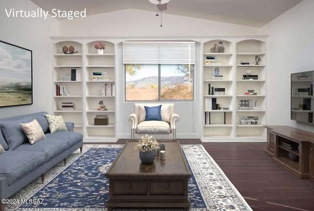 living room with ceiling fan, dark wood-type flooring, and vaulted ceiling