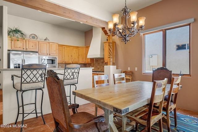 dining area with light tile patterned floors and a notable chandelier