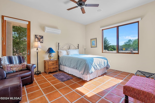 bedroom featuring an AC wall unit, ceiling fan, and tile patterned flooring