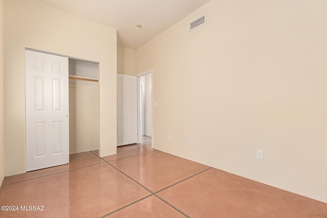 unfurnished bedroom featuring a closet