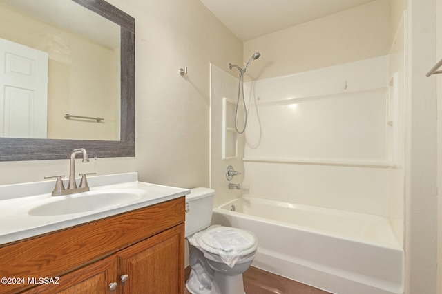 full bathroom featuring vanity, toilet, and shower / bathtub combination