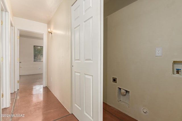 corridor with concrete flooring