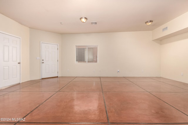 view of tiled spare room