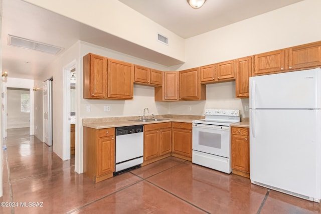 kitchen with sink and white appliances