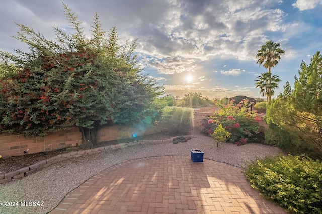 view of patio terrace at dusk