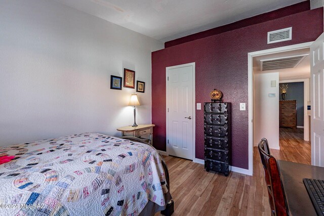 bedroom featuring light hardwood / wood-style flooring