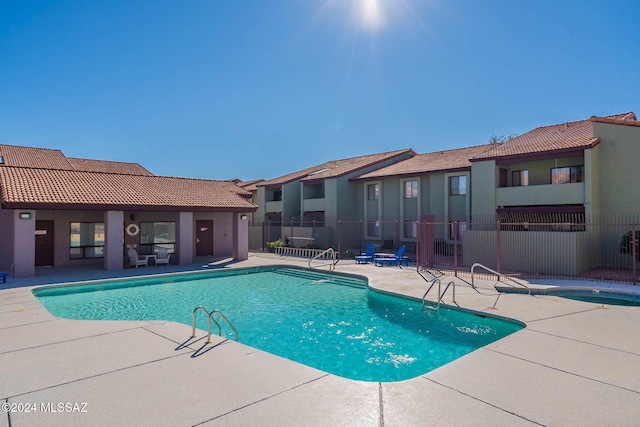 view of pool featuring a patio area