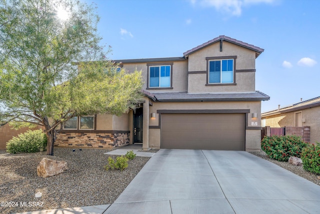 view of front of home with a garage