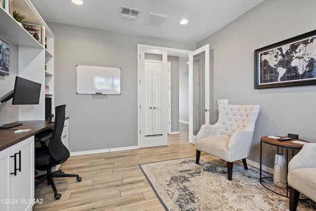 office area featuring light hardwood / wood-style flooring