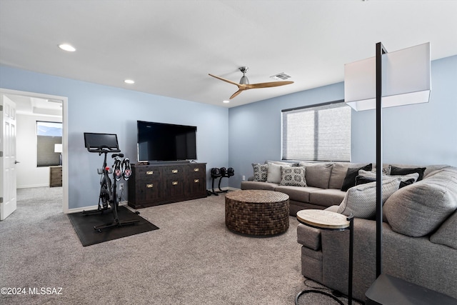 living room with carpet flooring and ceiling fan