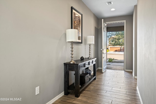 doorway to outside featuring hardwood / wood-style flooring