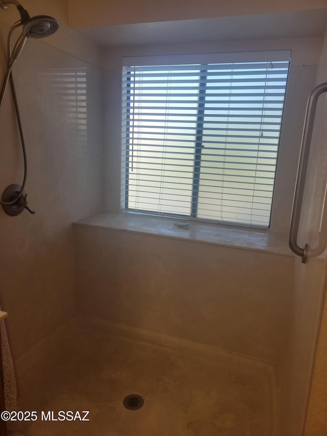 bathroom featuring walk in shower