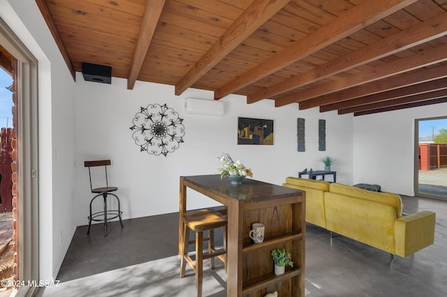 interior space featuring a wall unit AC, wooden ceiling, and beamed ceiling