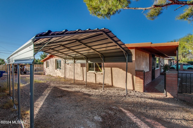 view of car parking featuring a carport